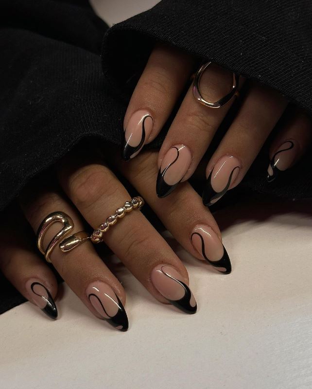 Black And Nude Swirl Nails