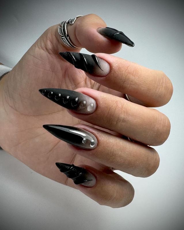 Edgy Black Stiletto Nails With 3D Accents