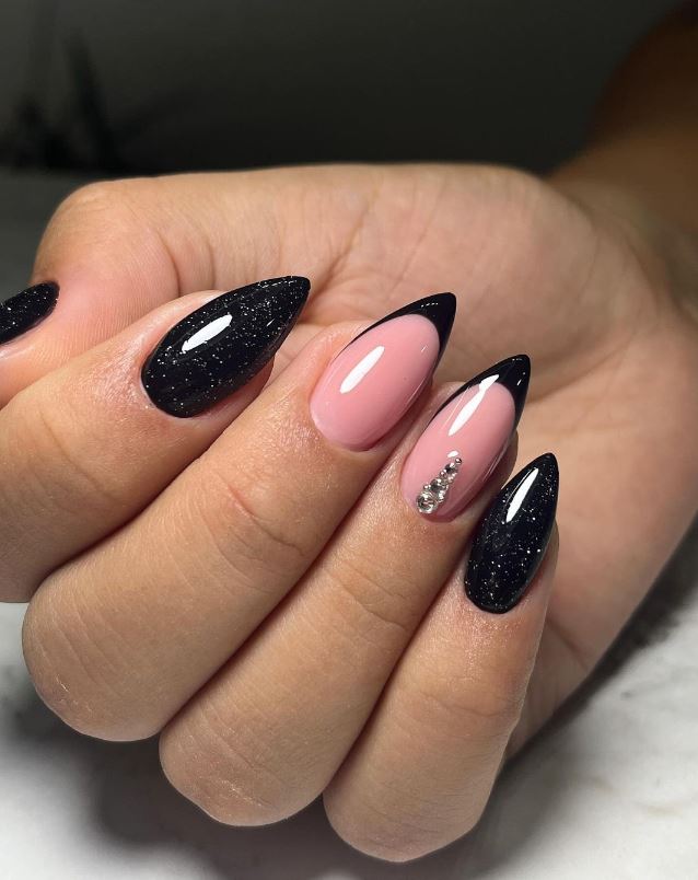 Elegant Black Almond Nails With Pink Accent