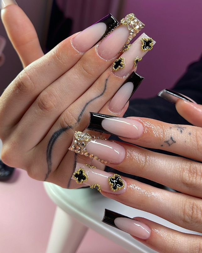 Elegant Black And Gold Nails