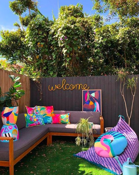Home Outdoor - An '80s brick home turned colourful rainbow paradise
