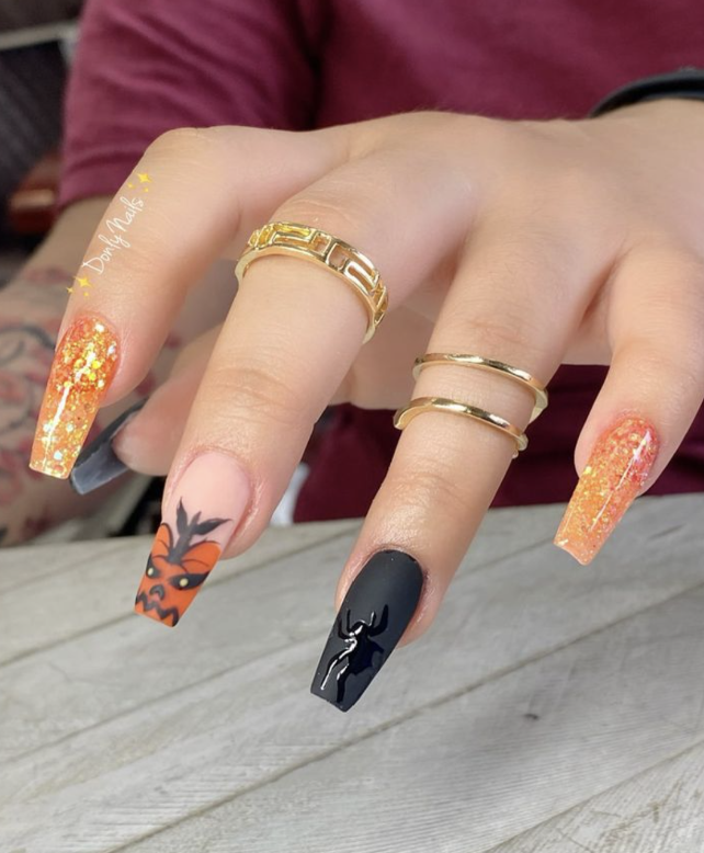 Halloween Nails With Glitter And Spooky Accents