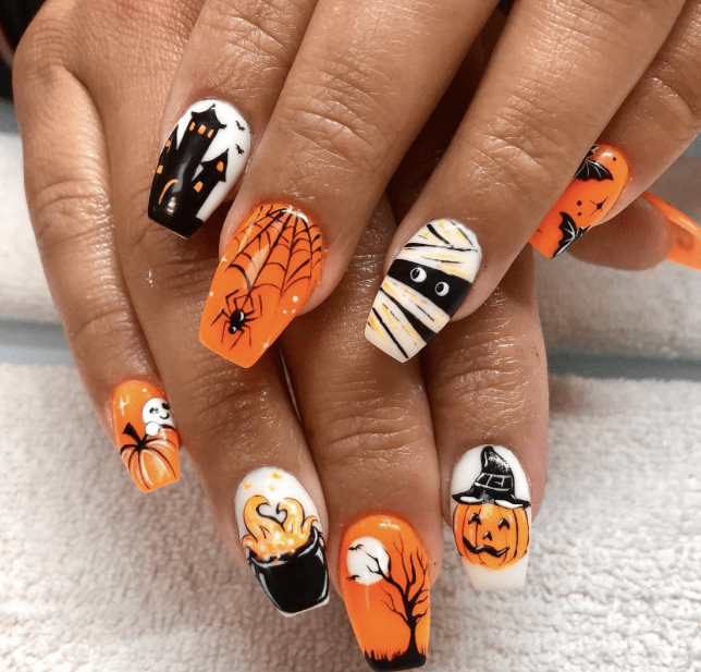 Halloween Nails With Haunted House And Mummy Designs