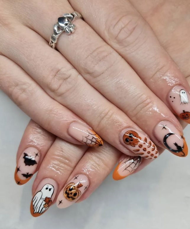 Playful Halloween Nail Art With Ghosts And Pumpkins