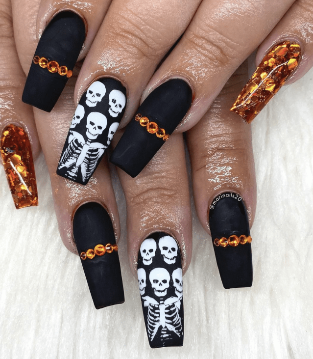 Spooky Matte Black Nails With Skull And Skeleton Designs