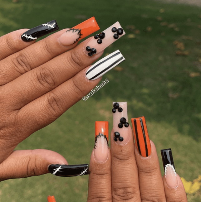 Stylish Halloween Nails With Stripes And